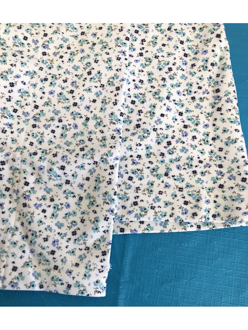 Justice Girls Skort. White With Blue & Green Flowers. White Shorts. Size 10. NWT